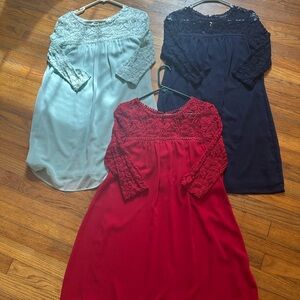 Elegant Lace Dresses in Red, Black, and Green